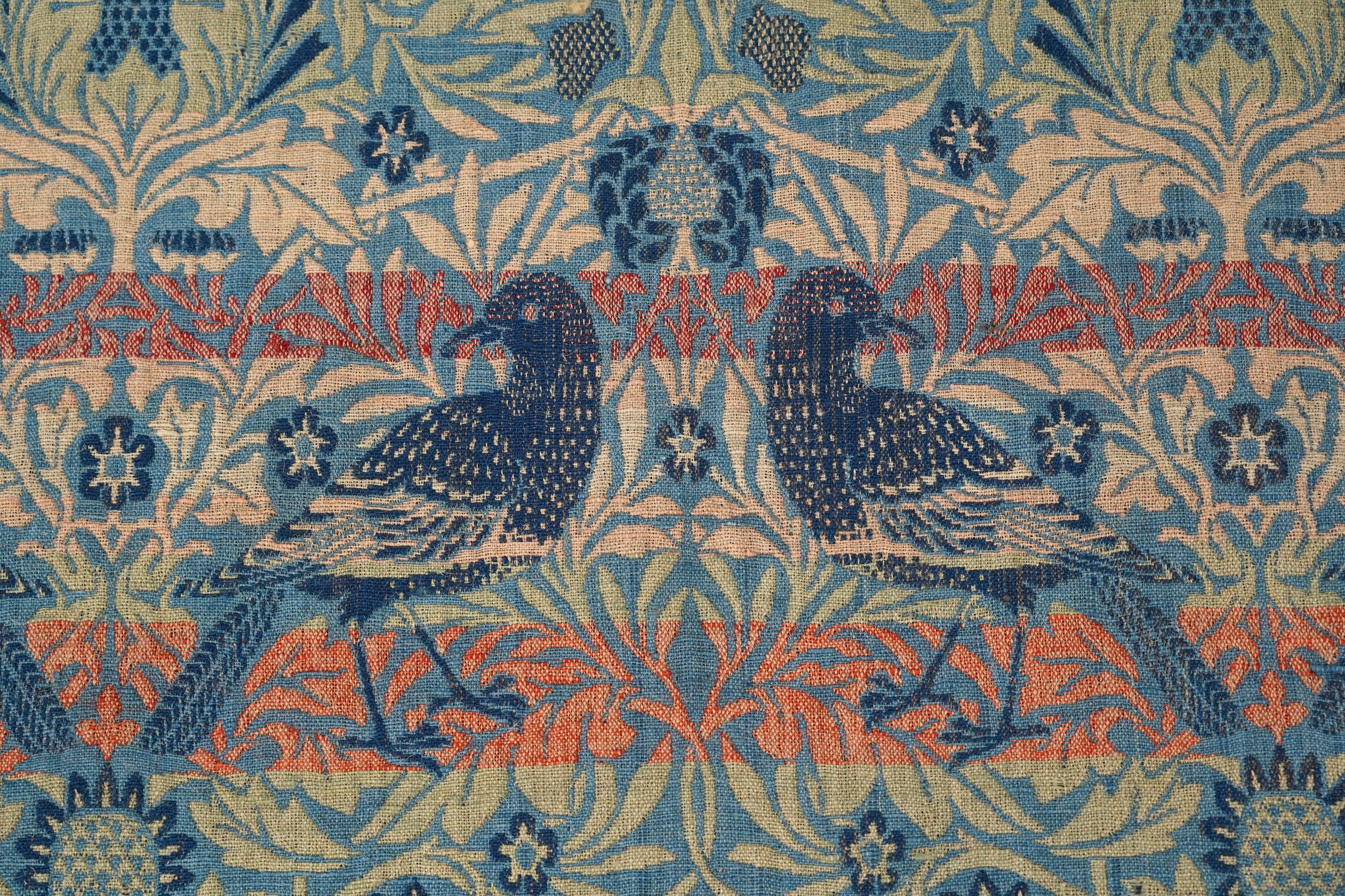 A later sample panel of William Morris ‘Bird’ design, jacquard-woven woollen double cloth, furnishing fabric. Originally manufactured in 1877-1888 by Merton Abbey Workshop for Morris &Co. 91cm x 71cm